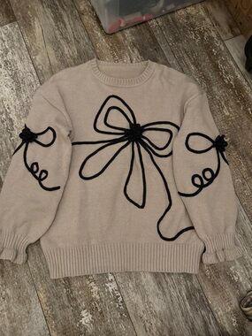 SHEIN Beige Crewneck Sweater with Black Bow Accent